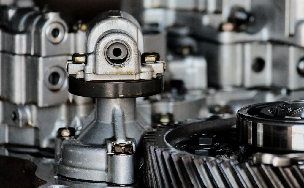 Close view of precision machined mechanical components in an assembled mechanism (illustrative photography, not a Kestrel part)